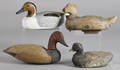 Four carved and painted duck decoys mid 20th c and contemporary