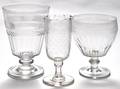 Three molded and cut colorless glass footed vases