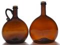 Two American blown molded amber glass flasks