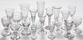 Eighteen assorted blown glass cordials and stemware
