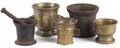 Three brass mortars