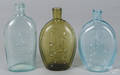 Three contemporary glass flasks
