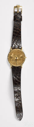 Corum 1899 20 gold coin watch with a leather band