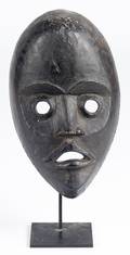 African carved mask by the Dan tribe of the Ivory Coast and Liberia