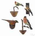 Four carved and painted songbirds early 20th c