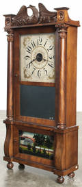 Forestville mahogany double decker mantel clock with a carved eagle crest