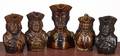 Five Rockingham type figural pitchers