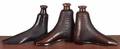 Three Rockingham type boot bottles