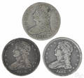Three Cap Bust silver half dollars