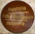 Redware charger 19th c