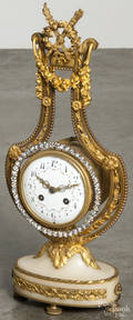 French bronze and dore lyre clock with a rhinestone surround