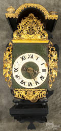 Dutch Frisian wall clock with a gilt surround and ebonized wall bracket