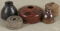 Five redware and stoneware inkwells