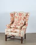 A Wingback Chair with Floral Upholstery
