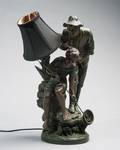 A Bronze Table Lamp of Man and Boy Fishing