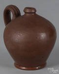 Small redware ovoid jug 19th c
