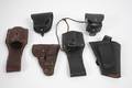 Four Holsters  Two Ammunition Boxes