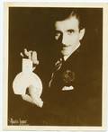 161 Four photographs of magician Paul Rosini