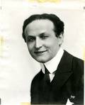 Bust portrait of smiling Houdini New York ca 1918