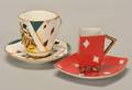 Two cups with card motif A fine porcelain coffee cup 