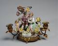 German Porcelain and Gilt Metal Candelabra