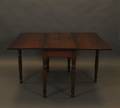 A Sheraton Walnut Drop Leaf Dining Table