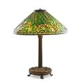 Tiffany studios table lamp with daffodil shade new york 1900s bronze leaded glass three sockets shade stamped tiffany studios new york base stamped tiffany studios new york 395 overall 26 x