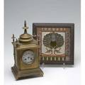 Bailey  co philadelphia brass carriage type clock with french movement together with a peacock design porcelain tile in frame clock 14