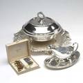 Collection of silver plate fortythree pieces including holloware salvers nut dishes a bainmarie a silent butler boxes and casseroles