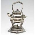 Christofle tea kettle silver plated with matching stand both chased with floral scrolls and the kettle with a wooden handle original burner has been replaced 12 12 to finial