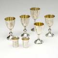 English silver judaica seven english silver kiddush cups london and birmingham makers ca 19261928 six uninscribed tallest 5 16 ozs troy