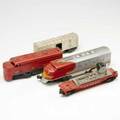 Lionel train cars including an automatic refrigerated milk car santa fe engine texas special engine and a track maintenance car