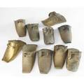 South american stirrups ten pieces some decorated in low relief some incised largest 5 x 11 12