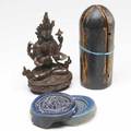 Assorted asian lot bronze buddha with inlaid turquoise beads pair of roof tile fragments purportedly from the beijing palace four fans wooden traveling shrine and two artists paint brushes one s