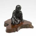 Japanese bronze figure young boy in sitting position on wooden base ca 1900 losses height of bronze 5 12