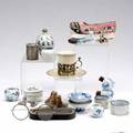 Asian etc twentyfour pieces nine ceramic bird feeders some damaged two sake cups covered box small stoppered vase one ladys embroidered slipper chinese cylindrical box oval ink stick pair