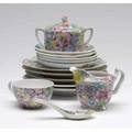 Chinese porcelain partial tea set thirtyseven pieces with floral decoration including plates cups and small cup stands