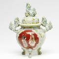 Satsuma covered jar with moriage decoration and lion handles and finial 11 14