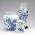 Chinese porcelain three pieces all with underglaze blue decoration including a tea pot with cover hexagonal vase with wooden stand and a jar with incomplete decoration of children playing 19th c