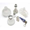 Perfume seven perfume bottles or flasks including two by lalique some with silver overlay some with silver mounts losses