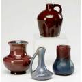 American art porttery including rookwood vase with purple glaze van briggle vase roycrofters jug fulper vase with loop handle tallest 5 14