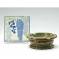 Marblehead  w j walley two pieces a marblehead 6 tile with blue floral deisng on an ivory ground and a w j walley ashtray tile marked ashtray 2 12 x 7