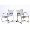 Garden pair of steel lounge chairs with perforated seats and gliding action 32 12 x 29 x 24