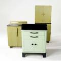 Hamilton mint and black enameled metal kitchen cabinet along with two avocado green wooden units one with electrified interior and a matching lift top trash can not shown largest 60 x 25 x 17