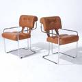 Pace pair of armchairs with tufted cordovan leather upholstery on polished chrome frames cloth label 33 x 20 12 x 25