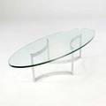 John stuart coffee table with elliptical glass top on polished steel base 16 x 58 x 24