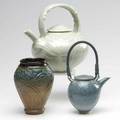 Elaine coleman  caryl elaine coleman teapot with carved cranes covered in celadon glaze 1993 caryl porcelain teapot pressed in a lace pattern and covered in blue glaze caryl stoneware vase with fl