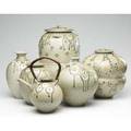 Tom turner six porcelain vessels covered in ash glaze with glaze trailed flowers all signed largest 17 x 9
