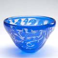 Czechoslovakian studio glass bowl in cobalt its interior acidetched with symbols and figures in flight illegible signature 6 x 10 dia