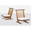 George nakashima 1905  1990 nakashima studios pair of conoid cushion lounge chairs new hope pa walnut hickory upholstery unmarked 33 12 x 34 x 35 provenance available copy of letter